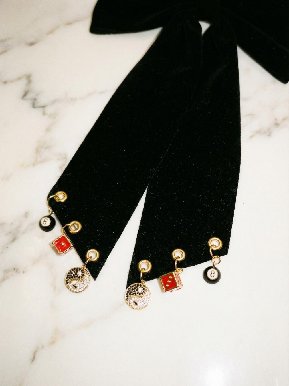 BLACK ROLL OF A DICE CHARM HAIR BOW